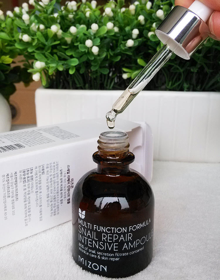 Anwendung der MIZON Snail Repair Intensive Ampoule mit Pipette