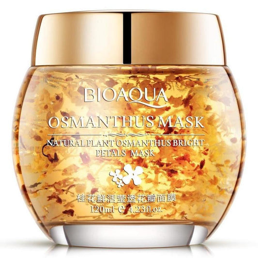 Ein Glas mit der Bioaqua Osmanthus Maske, gefüllt mit natürlichen Osmanthusblütenblättern und goldener Flüssigkeit.